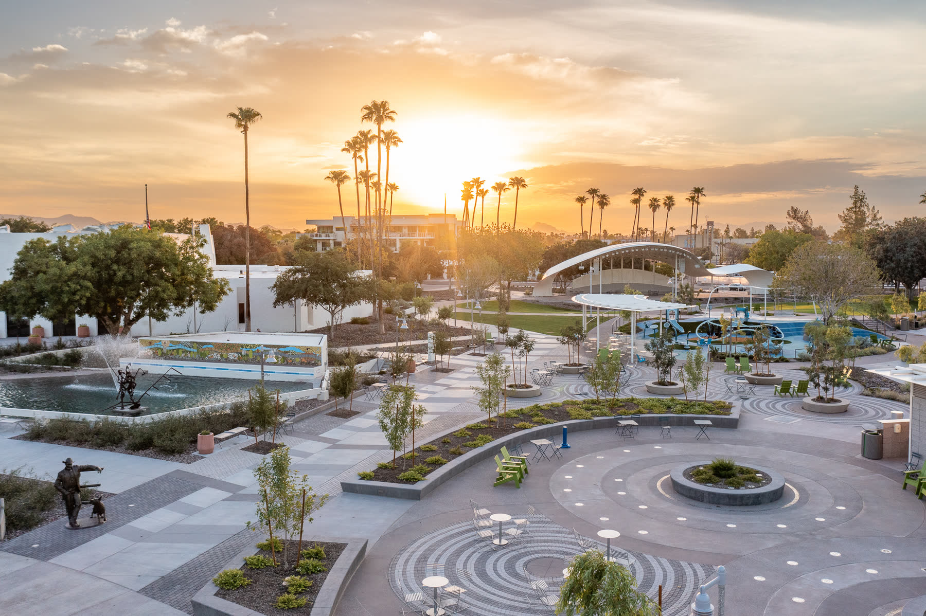Municipal plaza and water feature at sunset