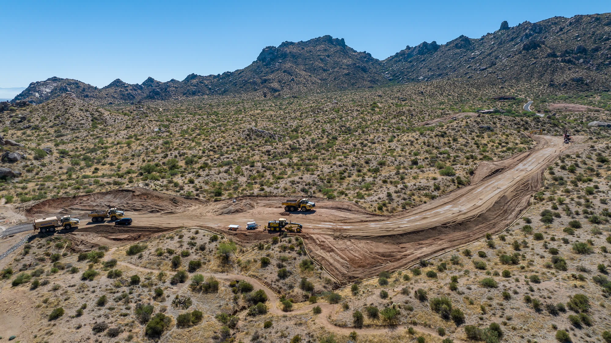 Raw land mapped from the air during a development's fundraising phase